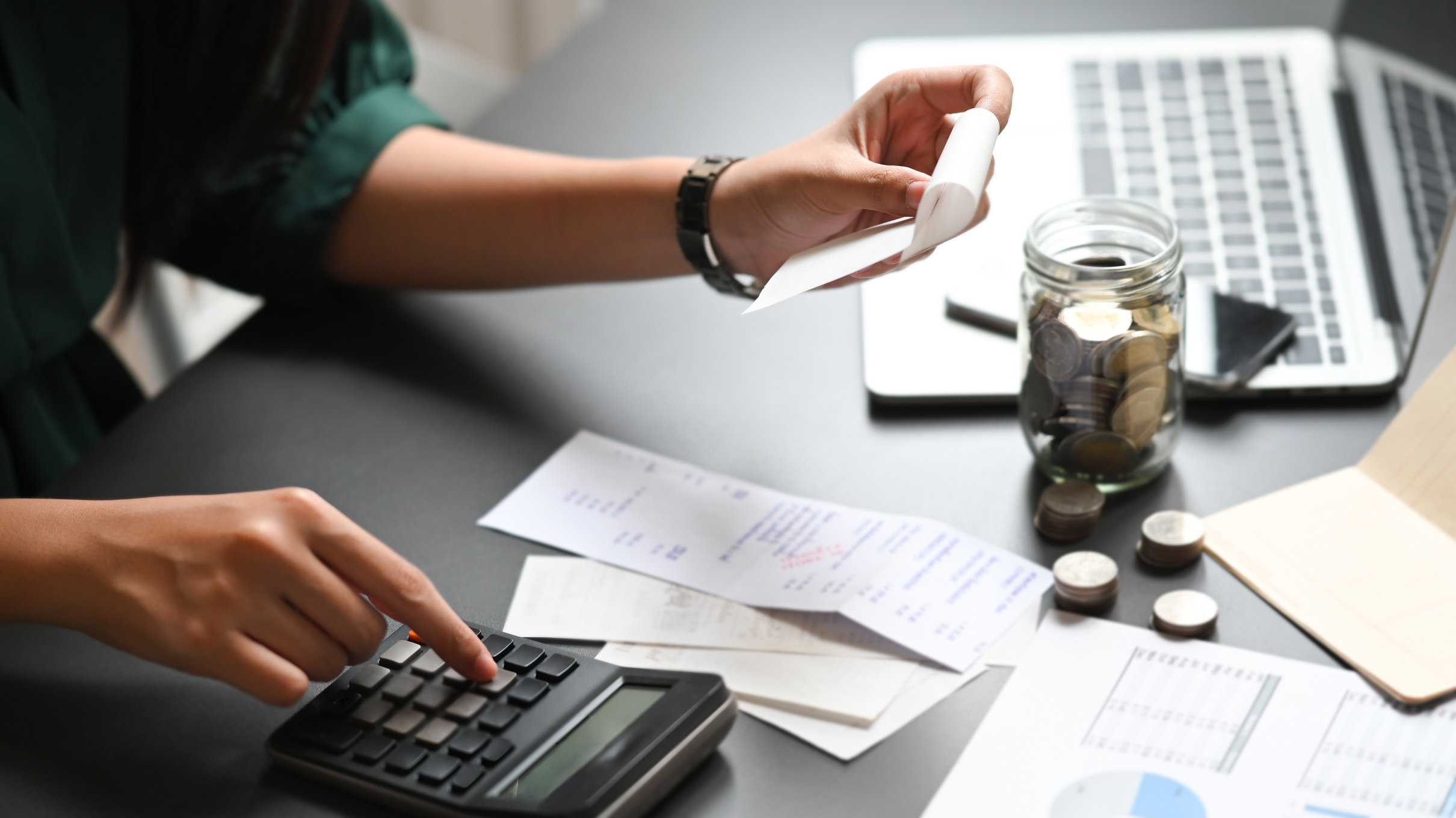 Woman Calculating Expenses